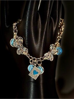 Gold Butterfly and Snake Charm Bracelet